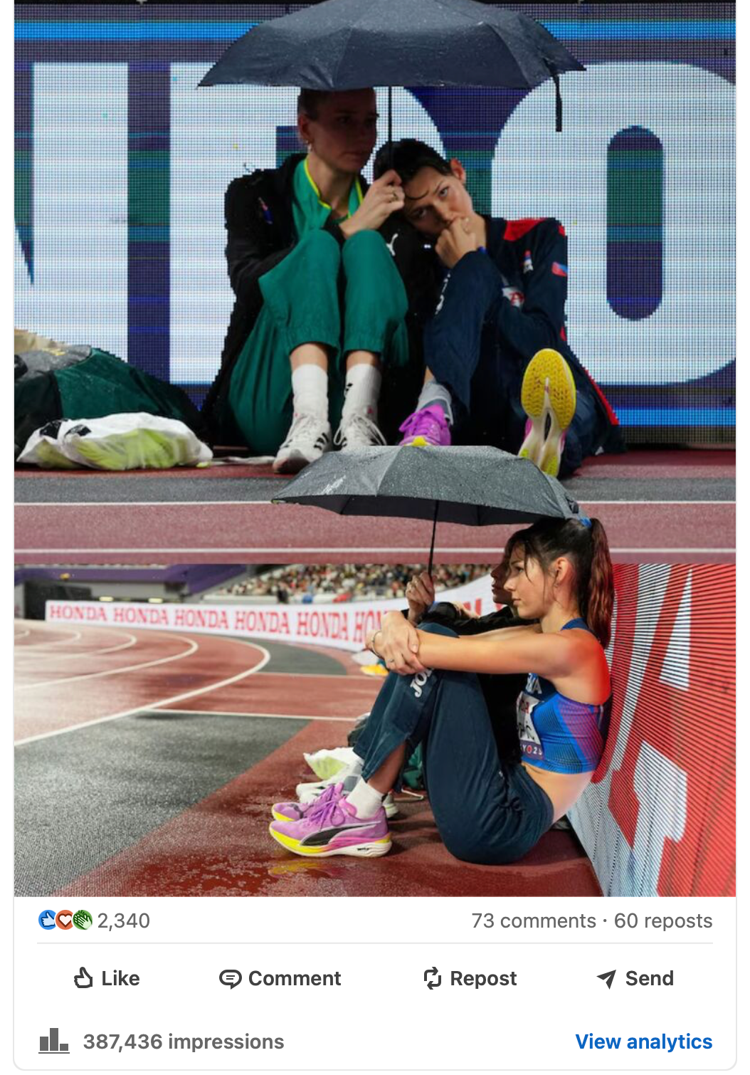 Two athletes sharing an umbrella beside the athletics track, in the photographs that inspired The Umbrella Effect
